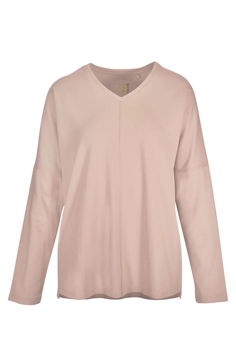 Chandail minimaliste encolure V, manches longues, coupe ample pour style décontracté.