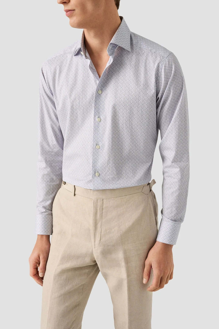 Chemise en sergé à motifs géométriques, élégante et confortable, parfaite pour une tenue professionnelle.