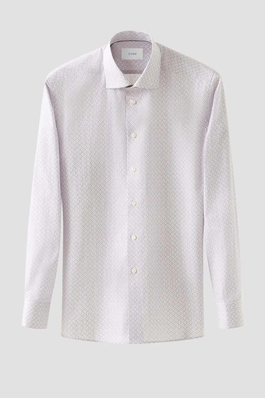 Chemise en sergé à motifs géométriques subtils, apportant élégance et confort pour les tenues professionnelles.