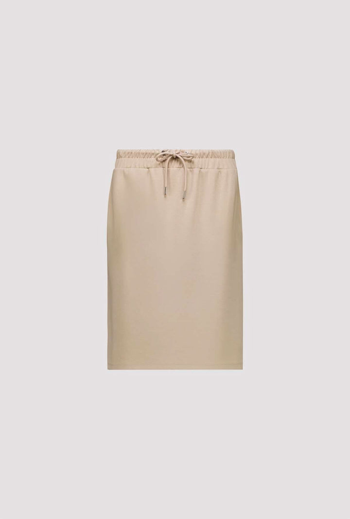Jupe droite à taille élastique beige avec cordon ajustable, coupe contemporaine et épurée pour un look polyvalent et confortable.