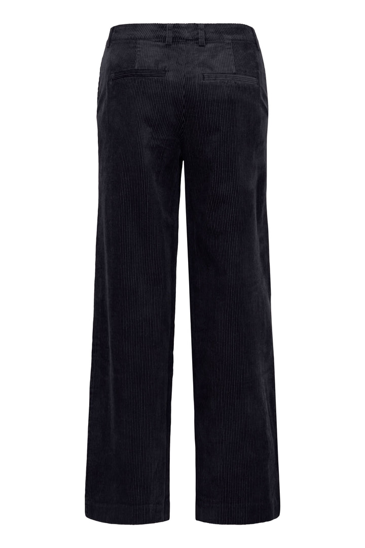 Pantalon Clarissi en velours côtelé noir, coupe large rétro-chic avec taille haute pour un look moderne et sophistiqué.