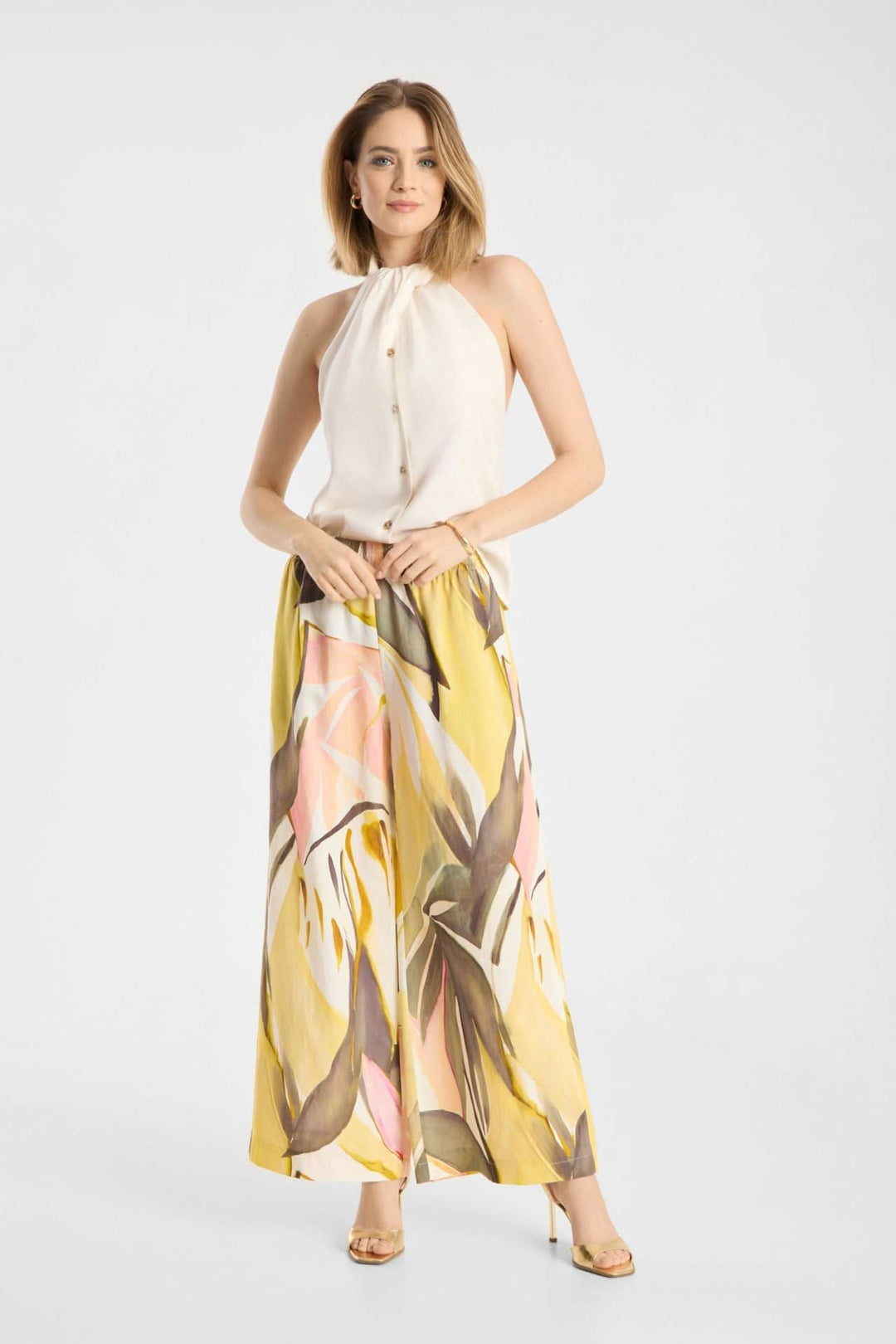 Pantalon Lizett fluide imprimé à taille élastique pour un style chic et confortable.