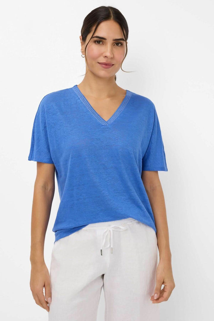 T-shirt col V CAELEN bleu, à épaules tombantes, en lin, pour un look décontracté et élégant.