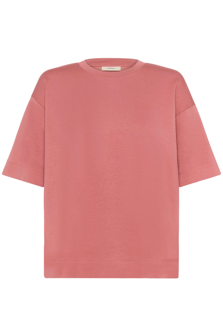T-shirt coupe ample Pannie en rose avec manches courtes et col rond, confortable pour un style décontracté et épuré.