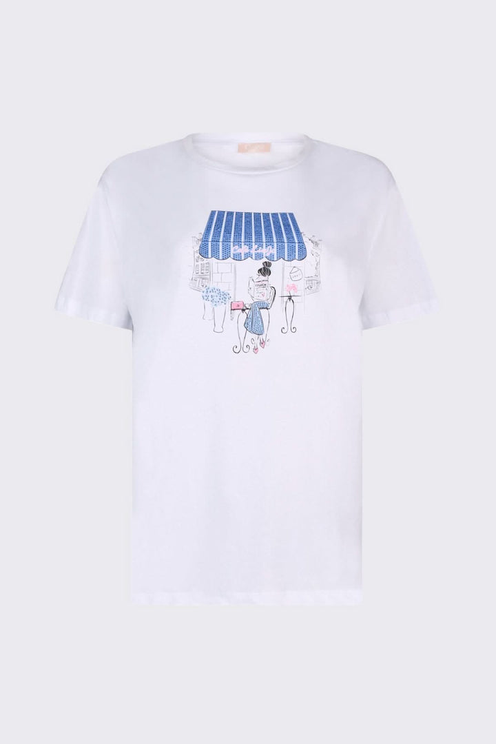 T-shirt à manches courtes avec imprimé graphique bleu sur fond blanc, coupe confortable.