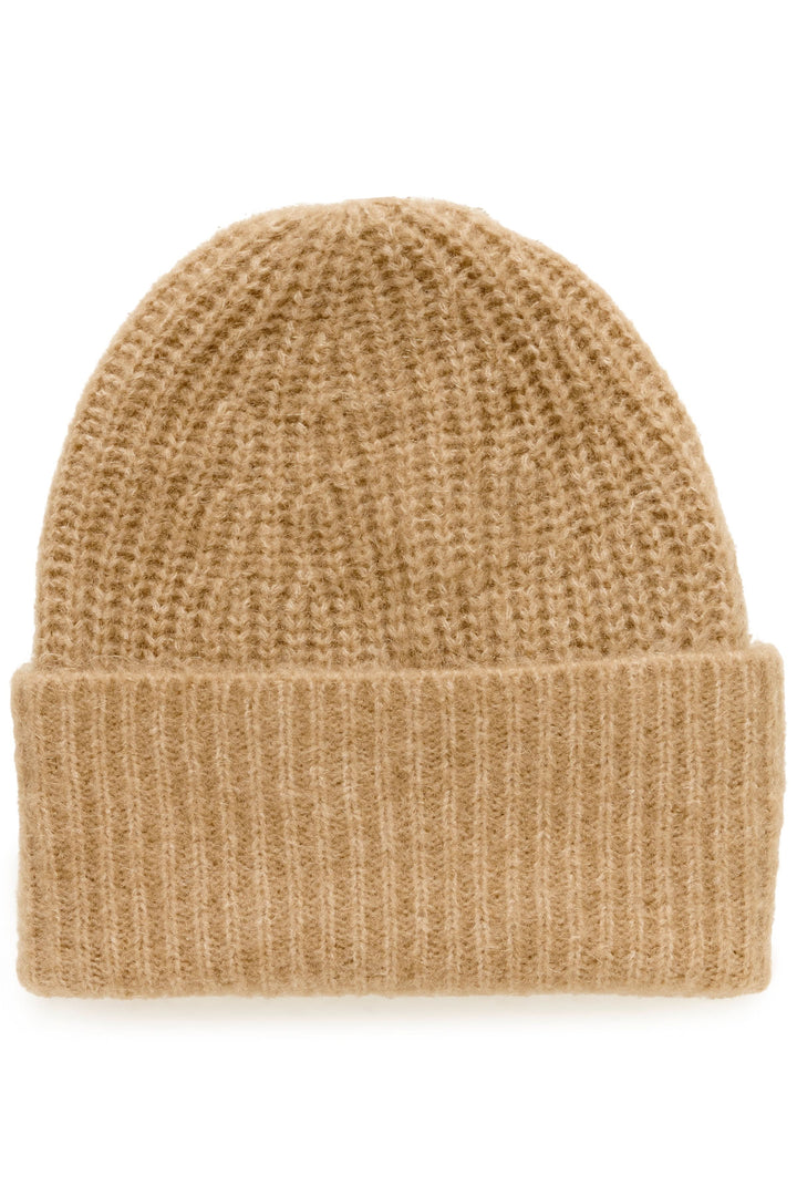 Tuque Sanja en tricot côtelé beige avec revers large, offrant chaleur et style moderne, pour un look urbain hivernal élégant.