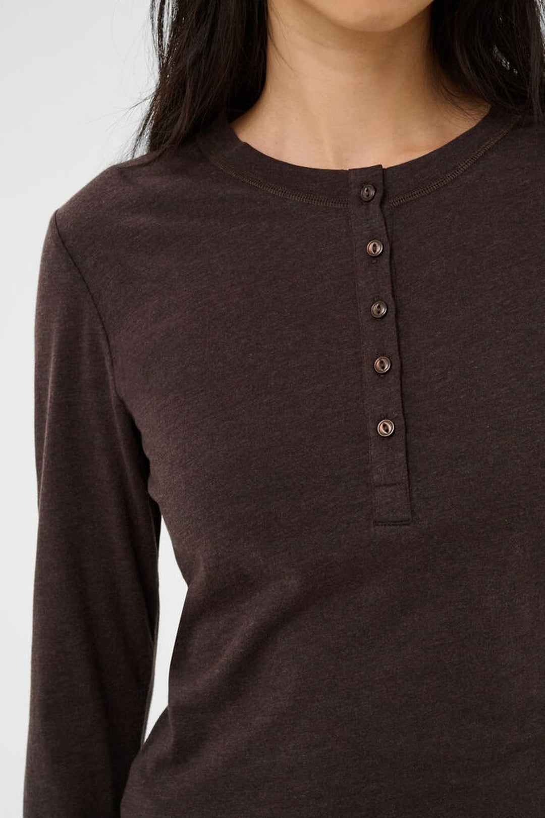 Front view of the white Chattia buttoned sweater Part Two for women worn by Valérie Simon