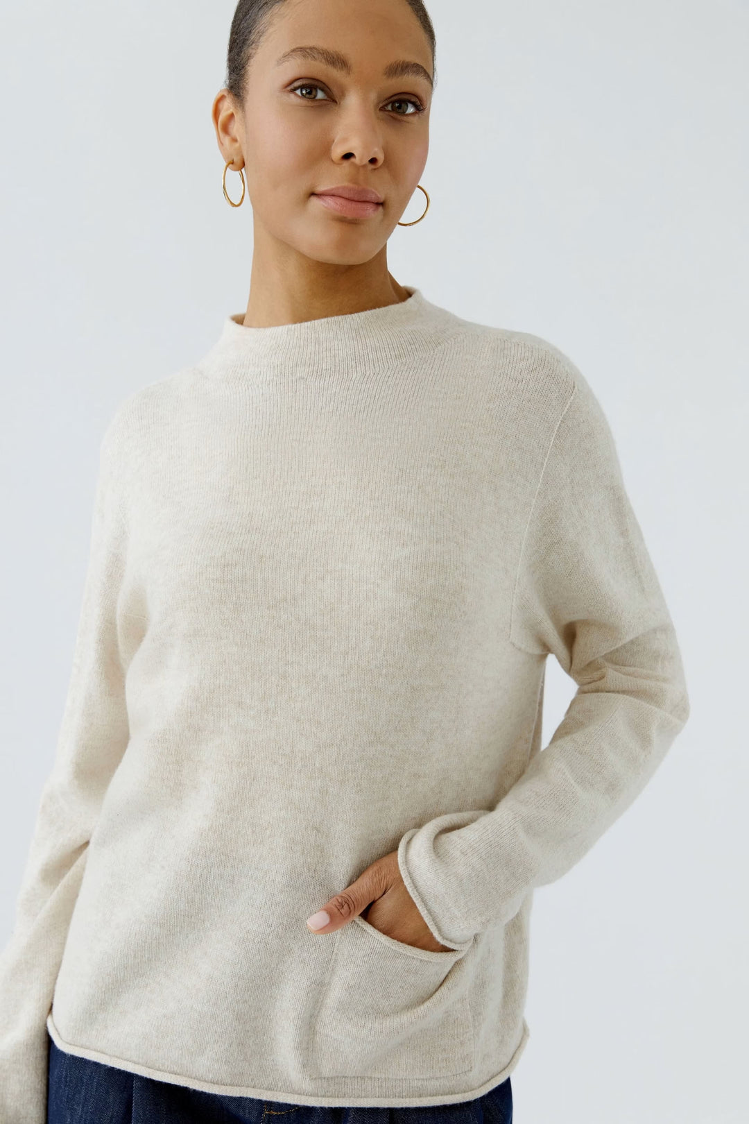 Front view of women’s black mock neck sweater Oui with braided details - Valérie Simon