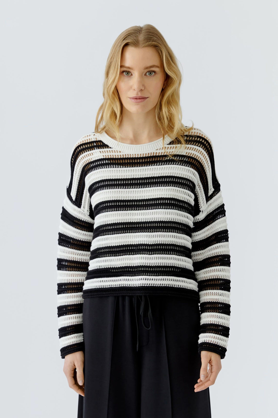 Front view of a beige striped knit sweater with openwork details for women by Oui - Valérie Simon