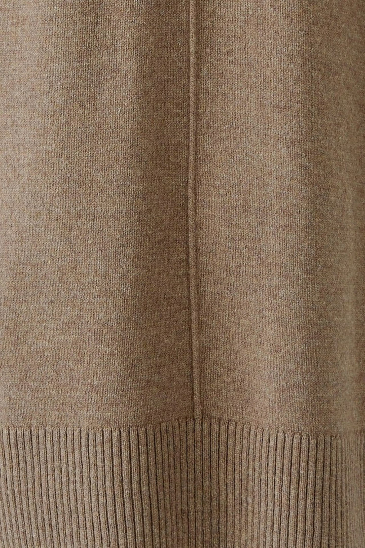 Front view of the long wool sweater Oui in beige with ribbed sleeves for women - Valérie Simon