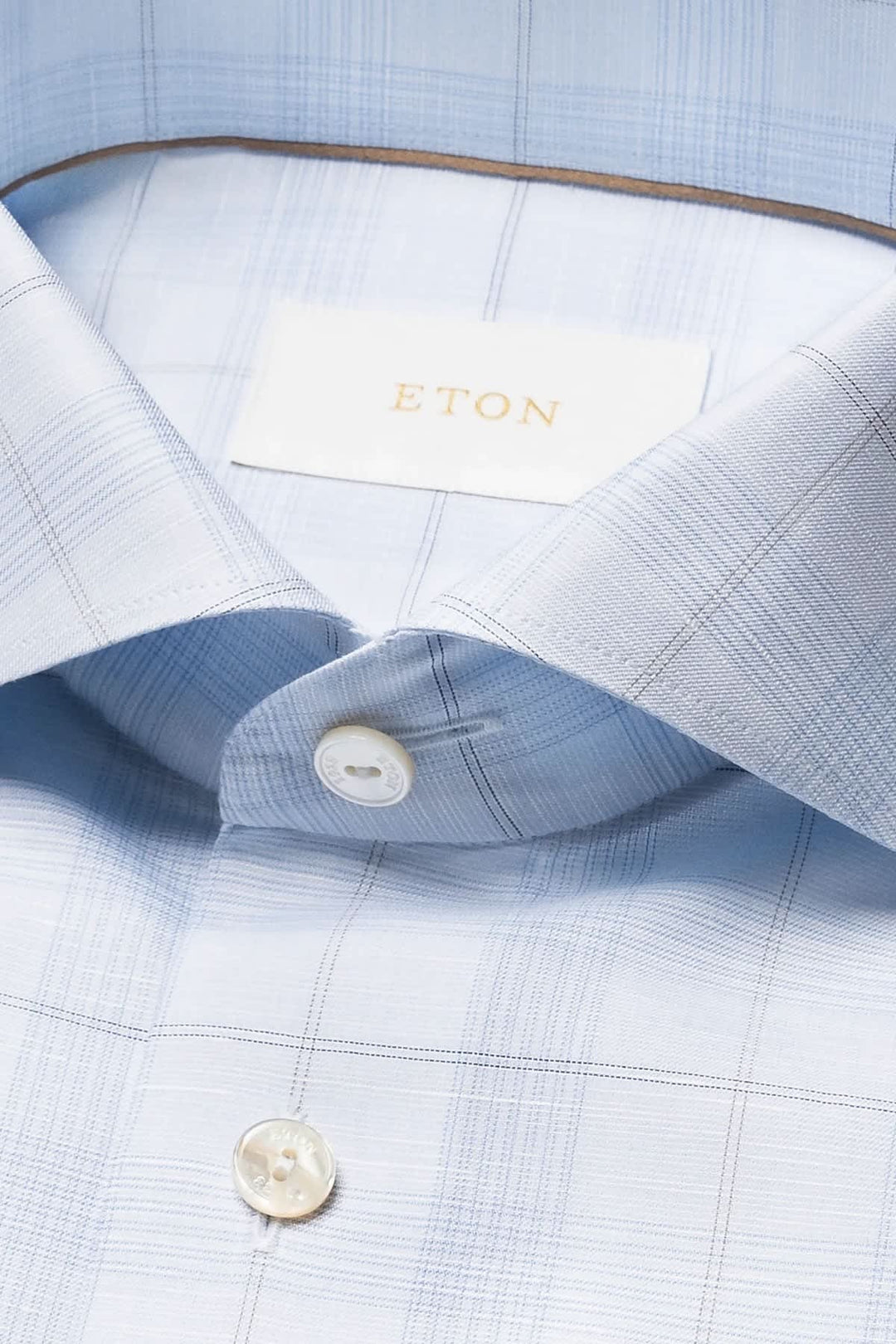 Close-up of a subtle blue Eton checkered men&