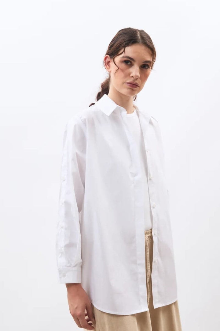Women’s long shirt with buttoned sleeves Humility