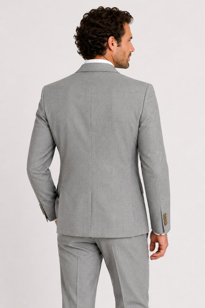 Full-front view of a subtle checkered pattern in stretchy gray wool for men by ATELIER - Valérie Simon