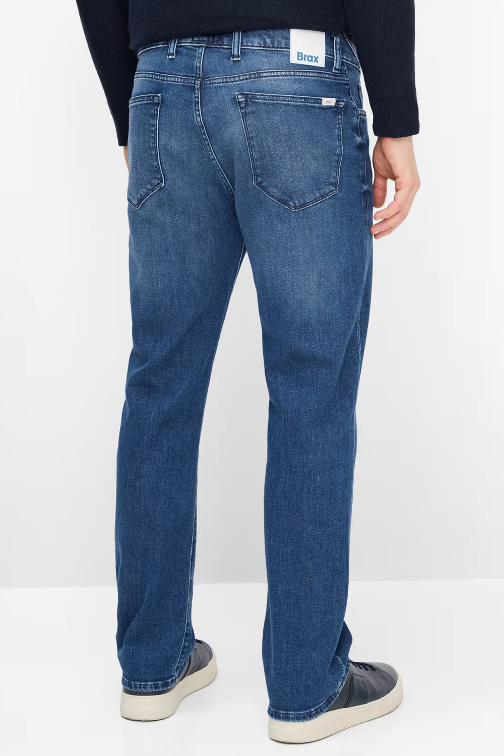 Side view of men's gray faded jeans with hem and seam details by Brax - Valérie Simon