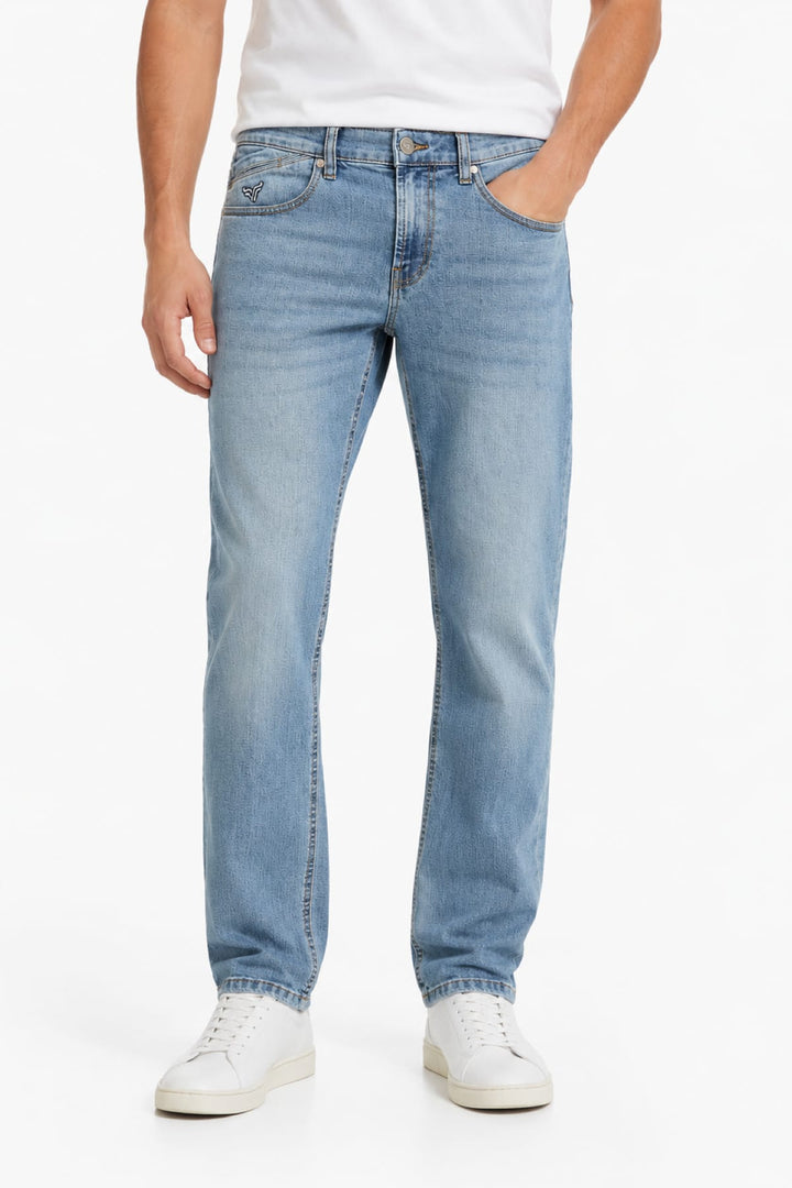 Side view of modern faded jeans with Black Bull stitching for men in gray - Valérie Simon
