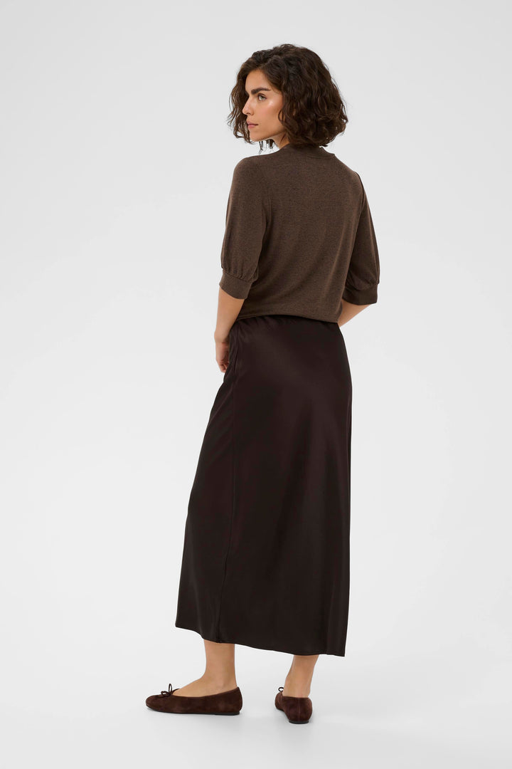 Front view of a long, flowing, textured Kaffe skirt in beige knit - Valérie Simon