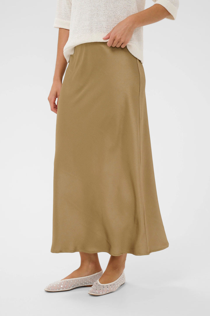 Front view of a long, textured Kaffe skirt for women in beige - Valérie Simon