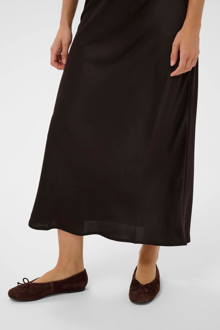 Front view of a long, beige, textured-knit Kaffe skirt for women - Valérie Simon