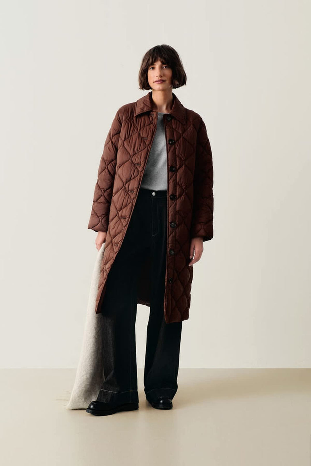 Side view of the Carine quilted coat Part Two in beige with slanted pockets for women - Valérie Simon