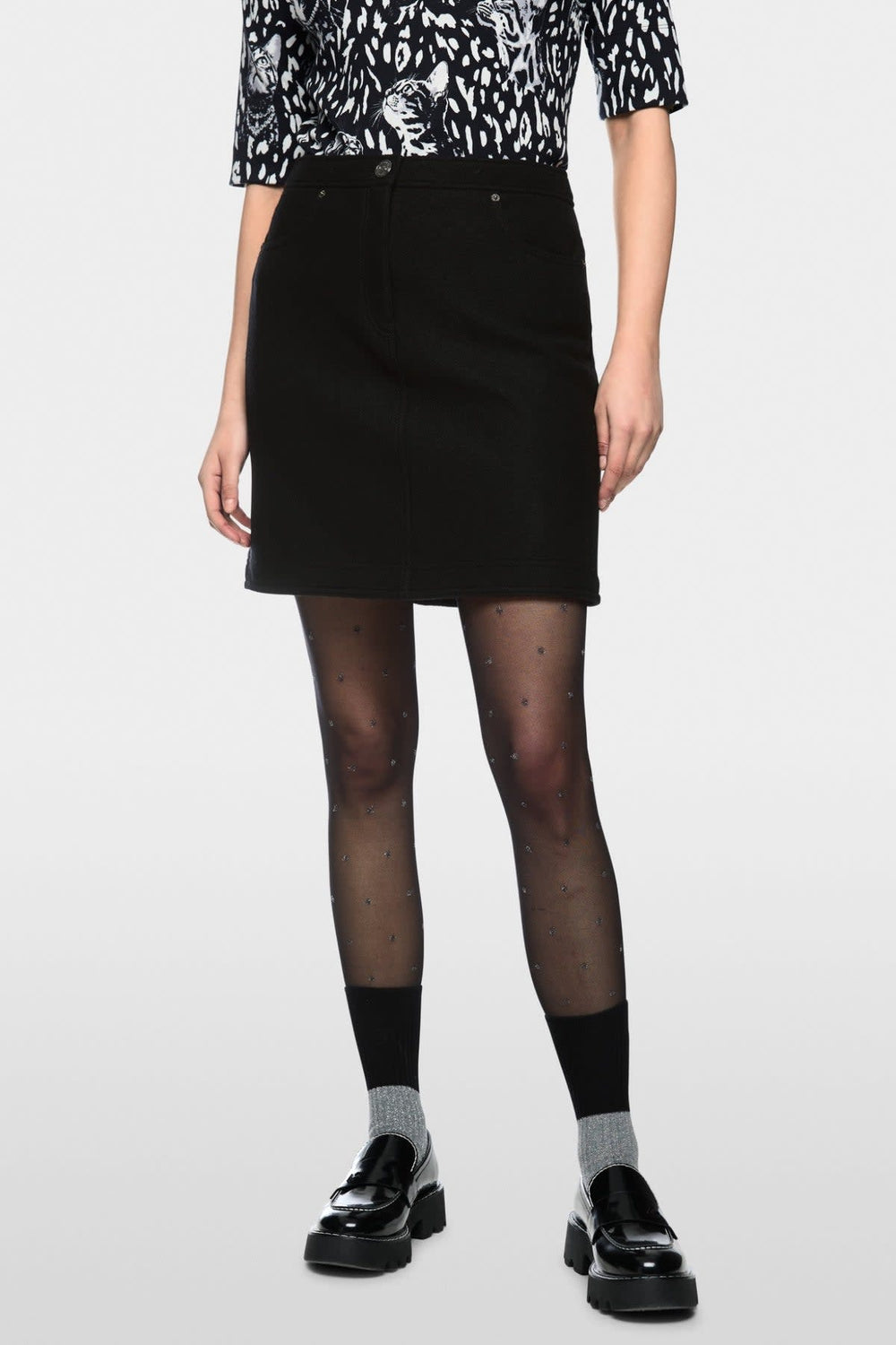 Women's virgin wool mini skirt, front view, by Marc Cain