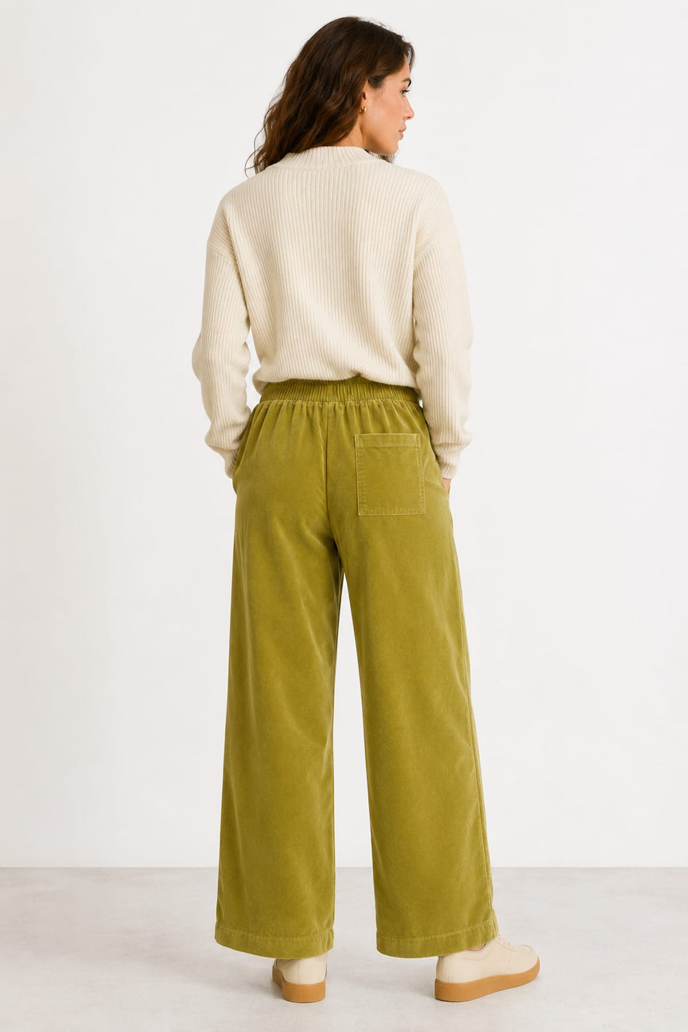 Side view of JC SOPHIE olive green wide corduroy pants with flared hem - Valérie Simon