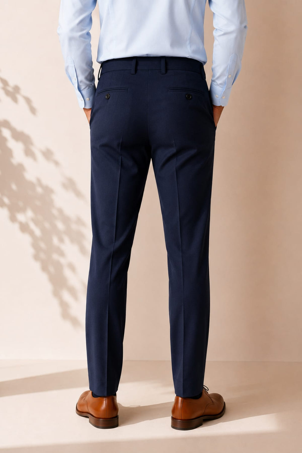 Front view of gray men's dress pants with pleats and detailed pockets - Valérie Simon