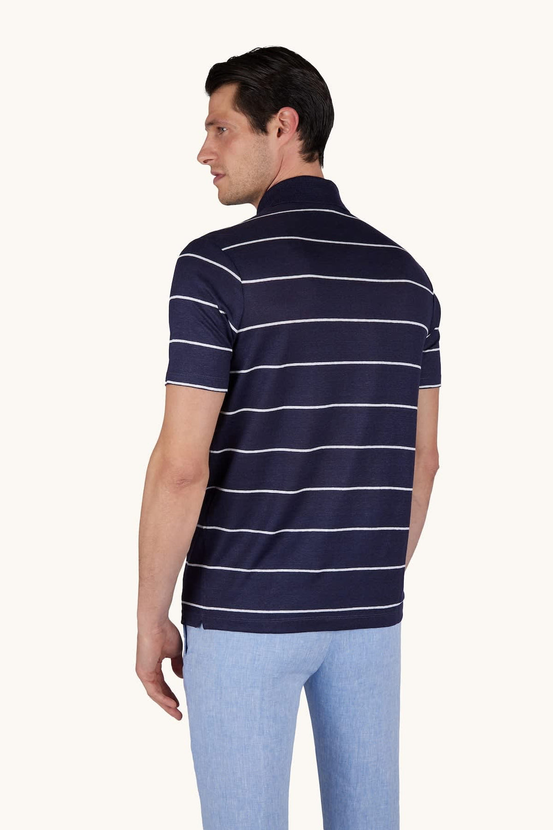 Front view of a blue and white striped Paul and Shark polo shirt for men - Valérie Simon