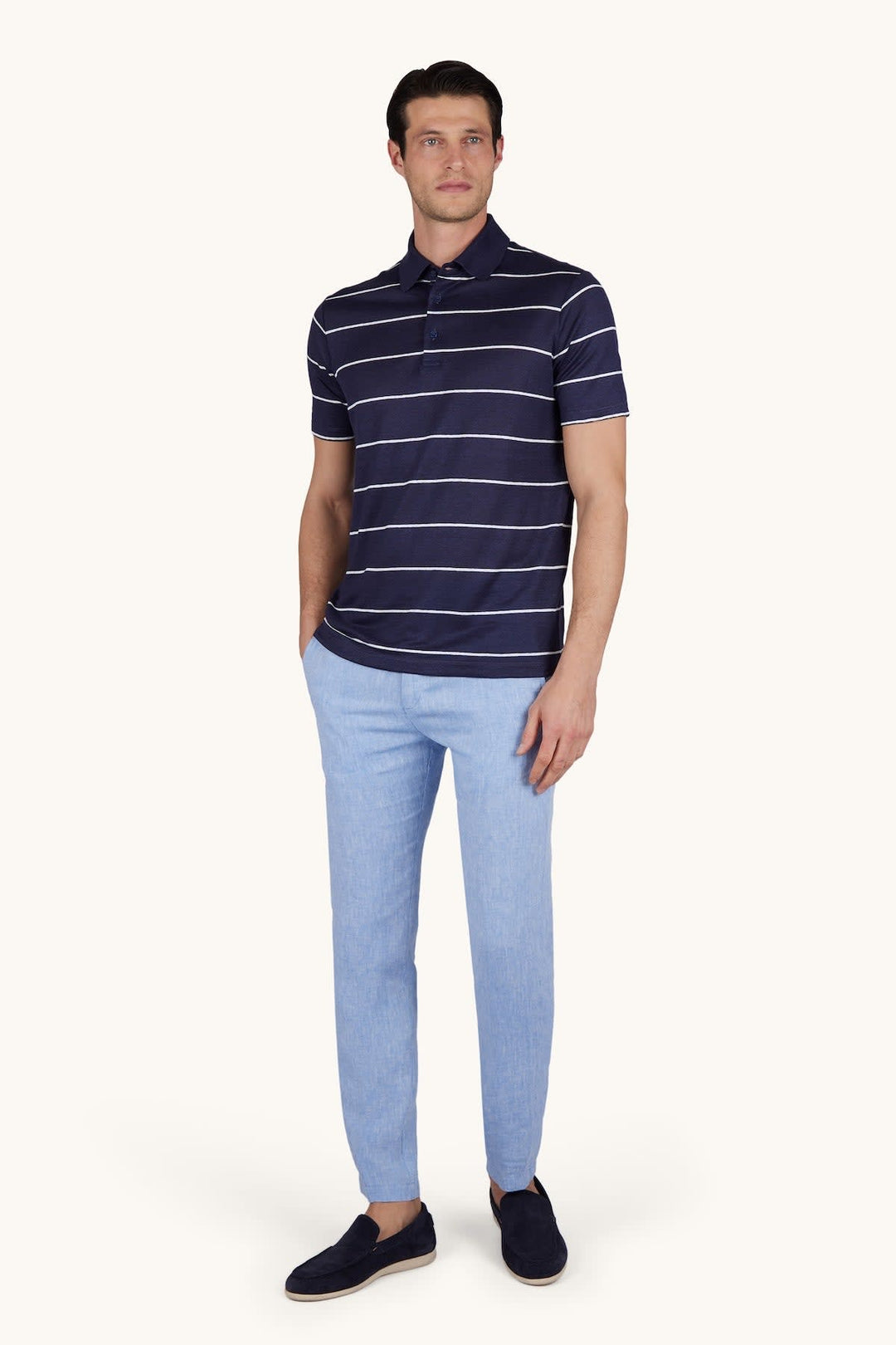 Front view of the Paul and Shark blue and white striped men&
