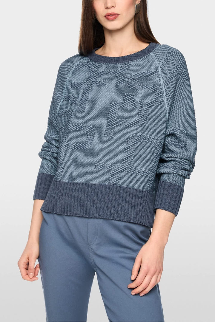 Vue de face pull en maille Marc Cain pour femme beige avec motif torsadé - Valérie Simon