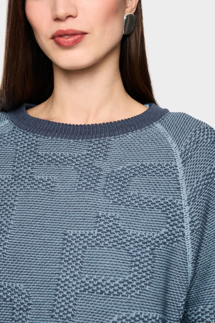 Vue de face pull en maille Marc Cain pour femme beige avec détails côtelés - Valérie Simon