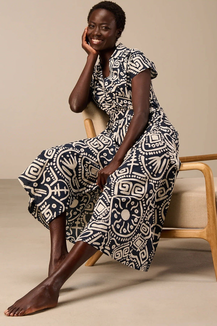 Back view of the red Nile-print maxi dress for women with a belt at Size - Valérie Simon