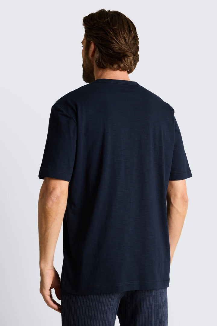 Side view of a light blue, short-sleeved Tom Tailor men&