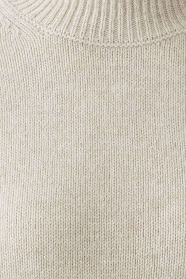 Chandail à col montant et manches mi-longues pour femme Oui