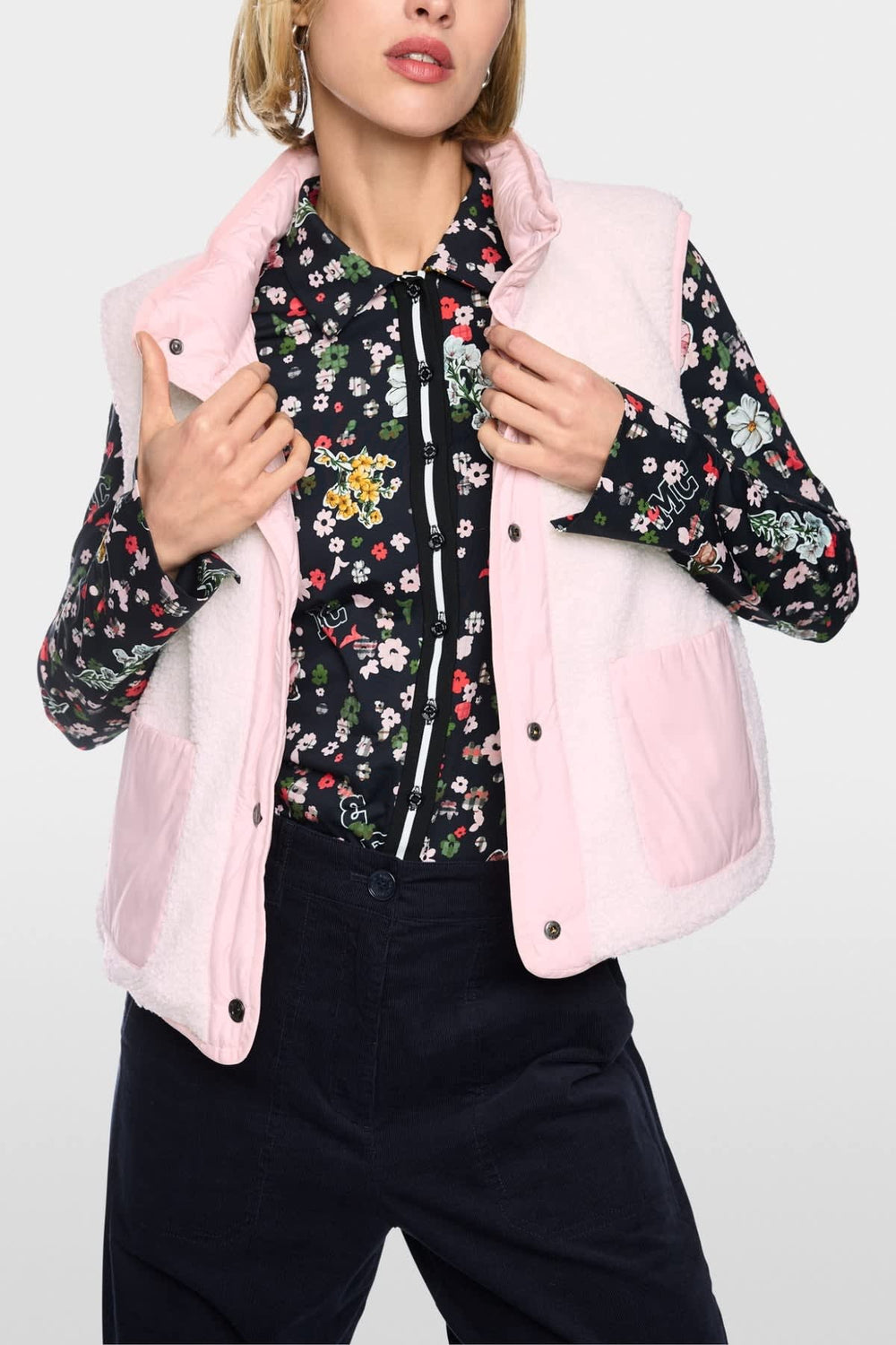 Women's quilted teddy-effect sleeveless jacket, front view, Marc Cain