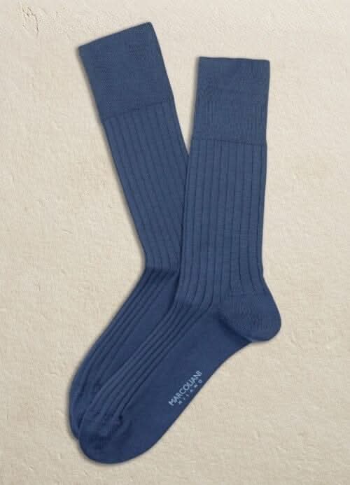 Chaussettes italiennes Marcoliani, coloris bleu, en coton et polyester, au style moderne et élégant.