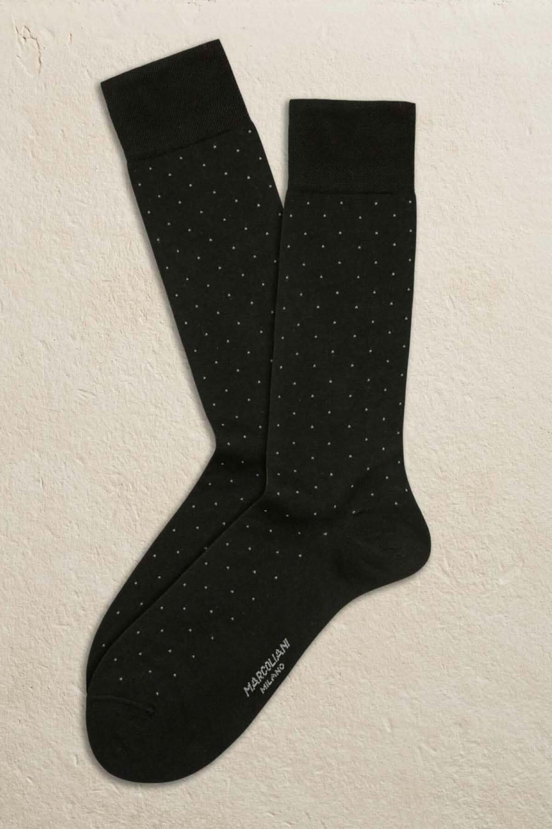 Chaussettes Marcoliani italiennes noires avec petits pois, en 72% coton et 28% polyester, style moderne.