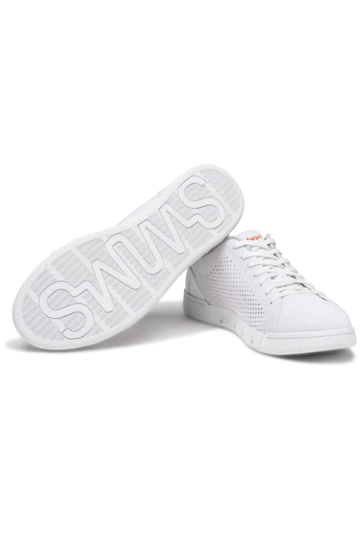 Chaussures tricot Breeze Tennis blanches avec semelle en caoutchouc, légères et respirantes, idéales pour les journées actives.