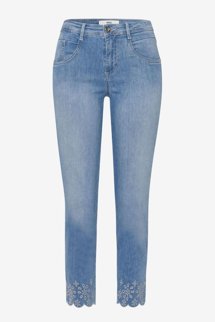 Jean Shakira S pour femmes, skinny 7/8 avec design floral élégant sur le bas, style moderne et accrocheur.