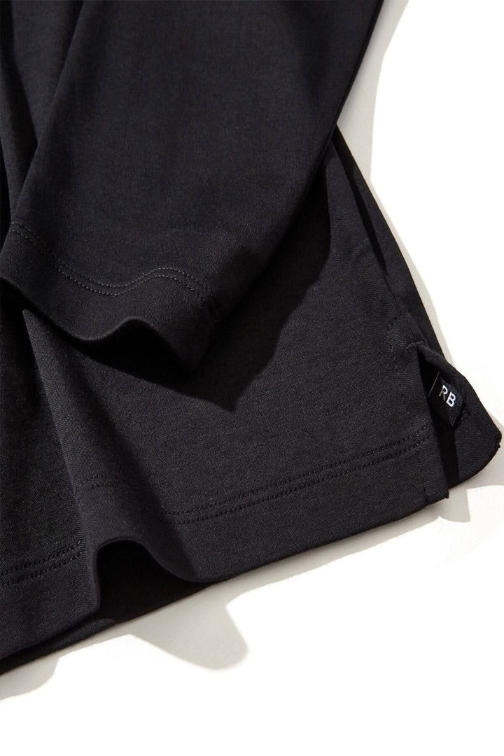 Polo Georgia en coton Pima noir avec col et patte de boutonnage en maille nid d&