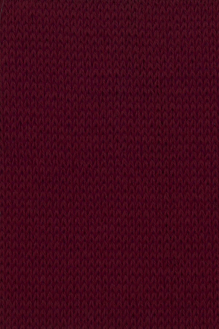 Textile en laine texturé de couleur bordeaux, parfait pour un pull élégant et chaud.